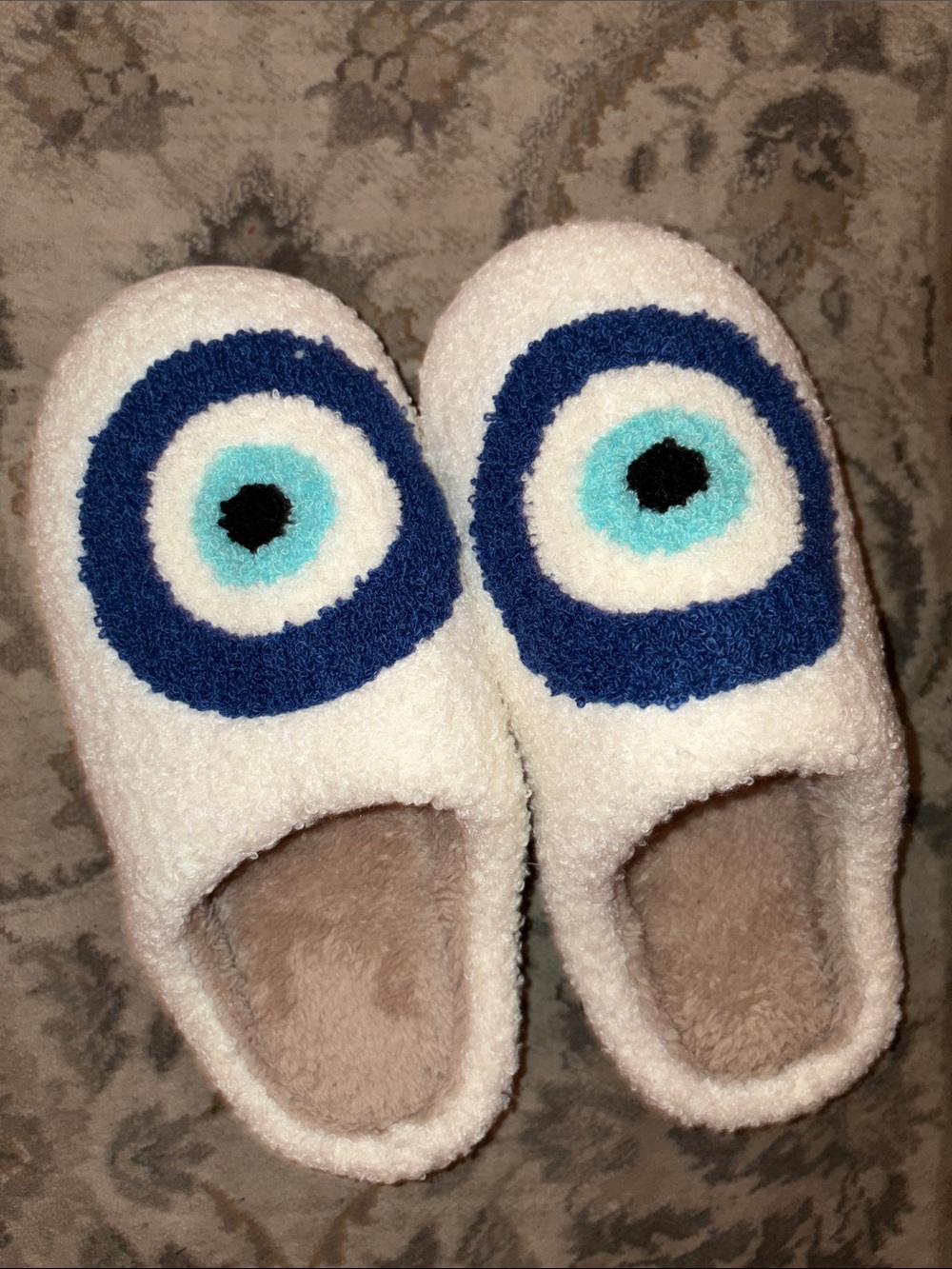 Cozy White Fuzzy Slippers with Blue Eye Motif